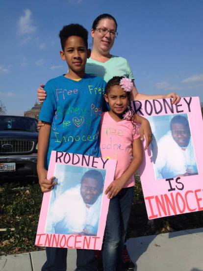 Supporters from Houston pose in their hand made solidarity t shirts at the "Rally For Justice for Rodney Reed" on Feb. 21, 2015. Photo by Randi Jones Hensley