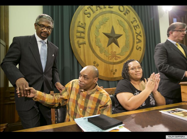 Texas State Rep. Harold shakes hands with Mark Clements at a press conference to show his support for abolition of the death penalty in Texas. Mark Clements spent 28 years in prison serving a juvenile life without parole sentence before he was finally cleared as Sabrina Butler looks on. Scott Cobb of the Texas Moratorium Network is at the podium.  Photo by Ralph Barrera for the Austin American Statesman 