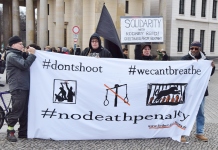 Protesters in Berlin demand justice for Rodney and an end to the death penalty. Photo by Uwe Hikschv