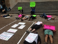 Students participate in a die-in at the foot of the UT tower on April 23, 2015. Photo by Mike Corwin