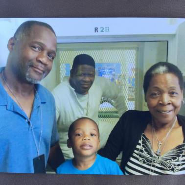 Rodrick, his son RJ, and Sandra Reed visit Rodney on death row